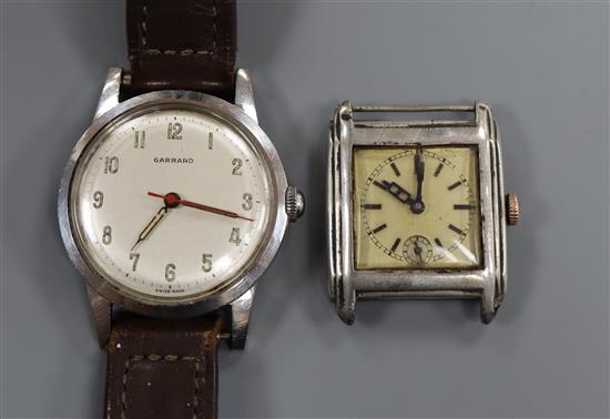 A 1950s stainless steel wristwatch retailed by Garrard and a 935 sterling wrist watch ( no strap).